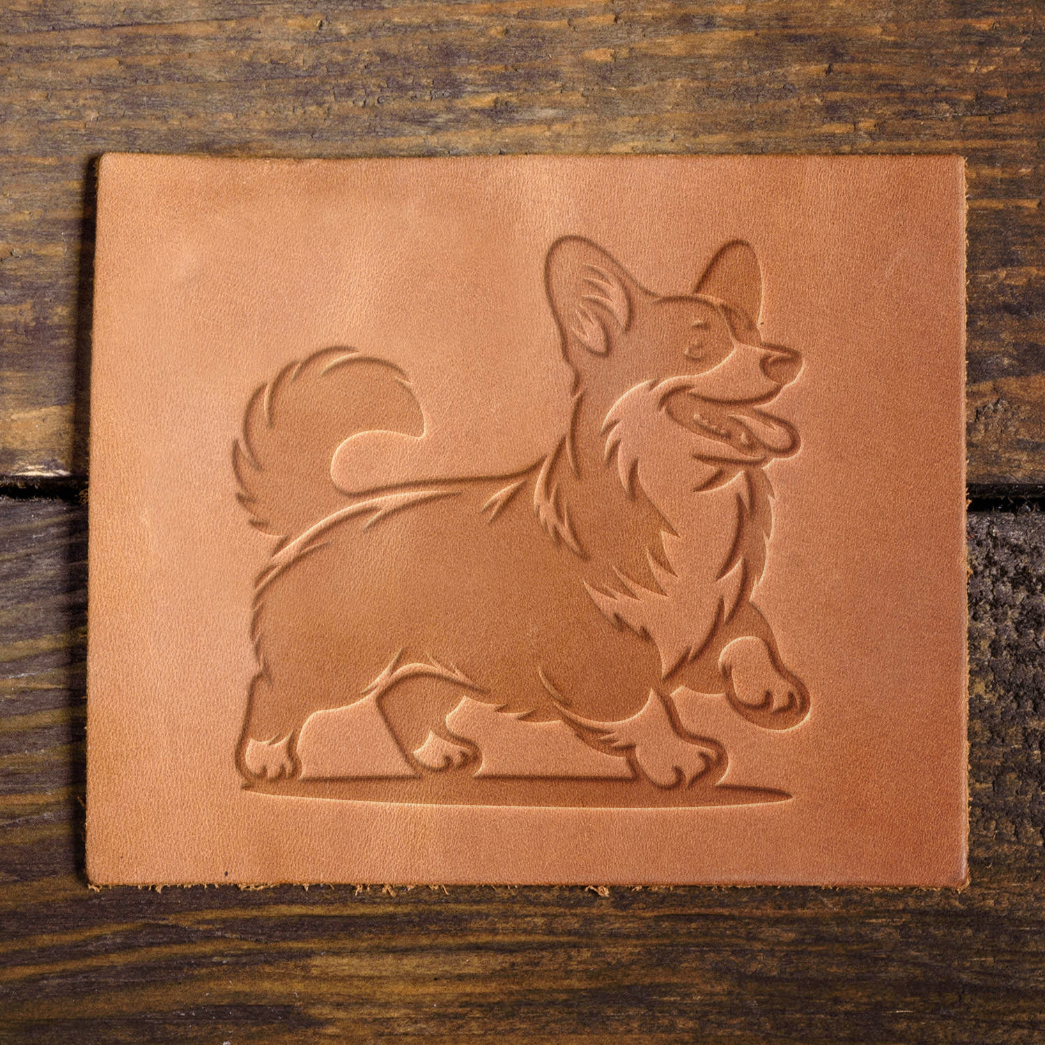 Leather sample with a detailed corgi stamp impression, perfect for dog lovers and custom pet-themed leathercraft.