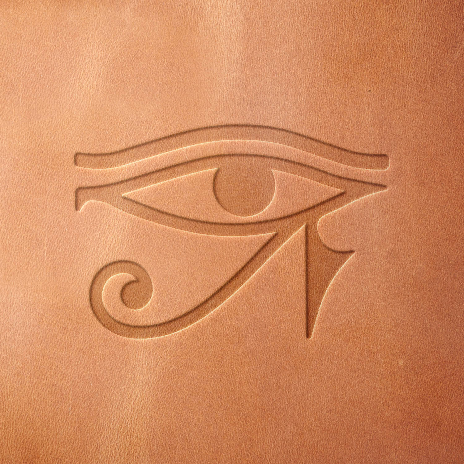 Leather piece stamped with a Delrin leather stamp of the Eye of Horus—perfect for mythology-themed leather accessories and symbolic art pieces.