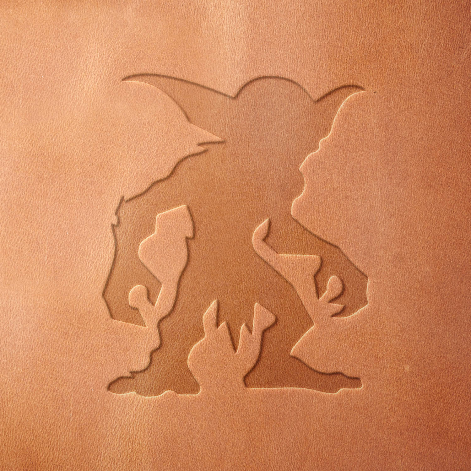 Leather piece stamped with a Delrin leather stamp of a goblin figure—perfect for fantasy fans and RPG-inspired leatherwork.