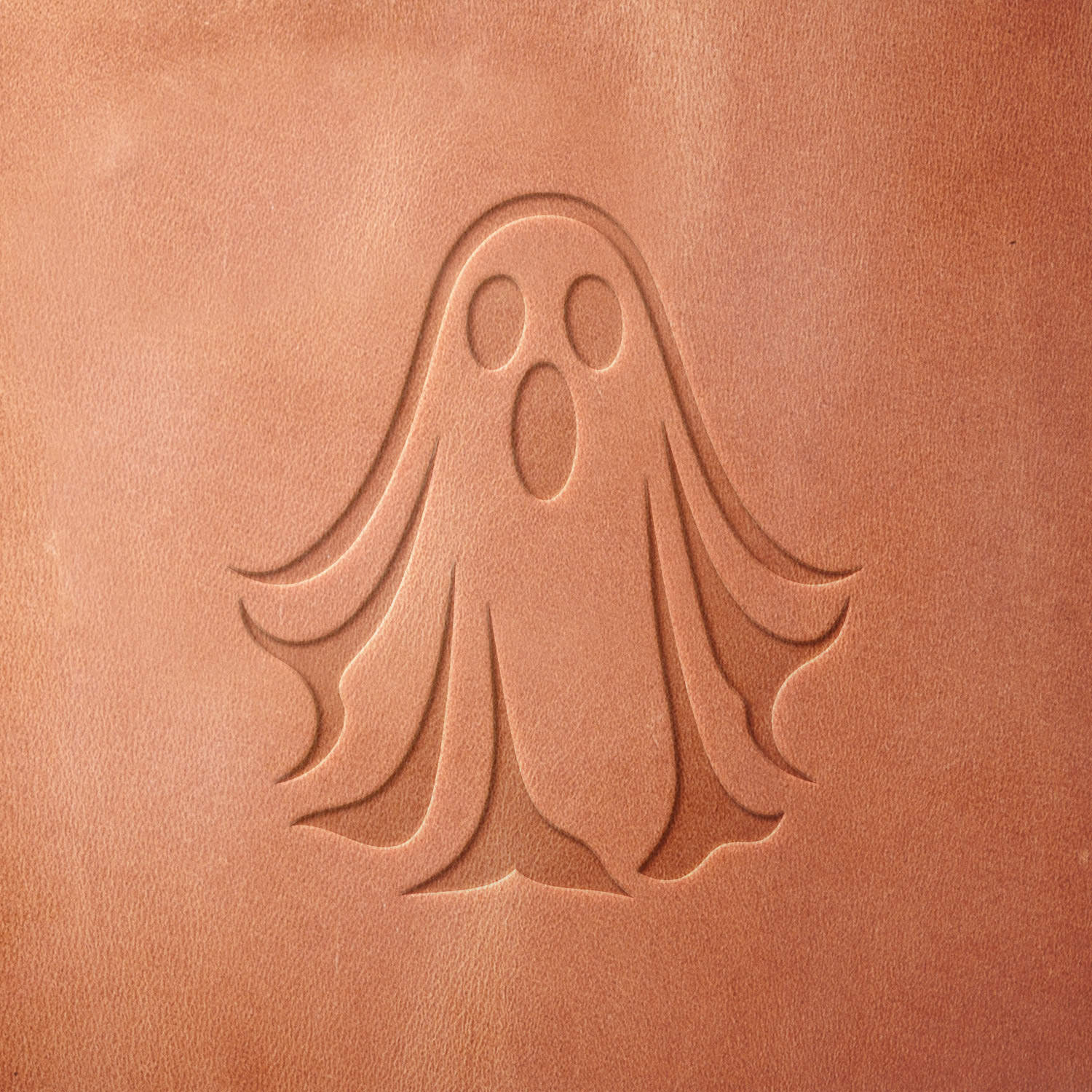 Leather sample featuring a stamped ghost design, created using a Delrin leather stamp—ideal for Halloween crafts, haunted themes, and custom leather engravings.