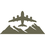 Silhouette of an airplane flying over a mountain range, symbolizing adventure and travel.