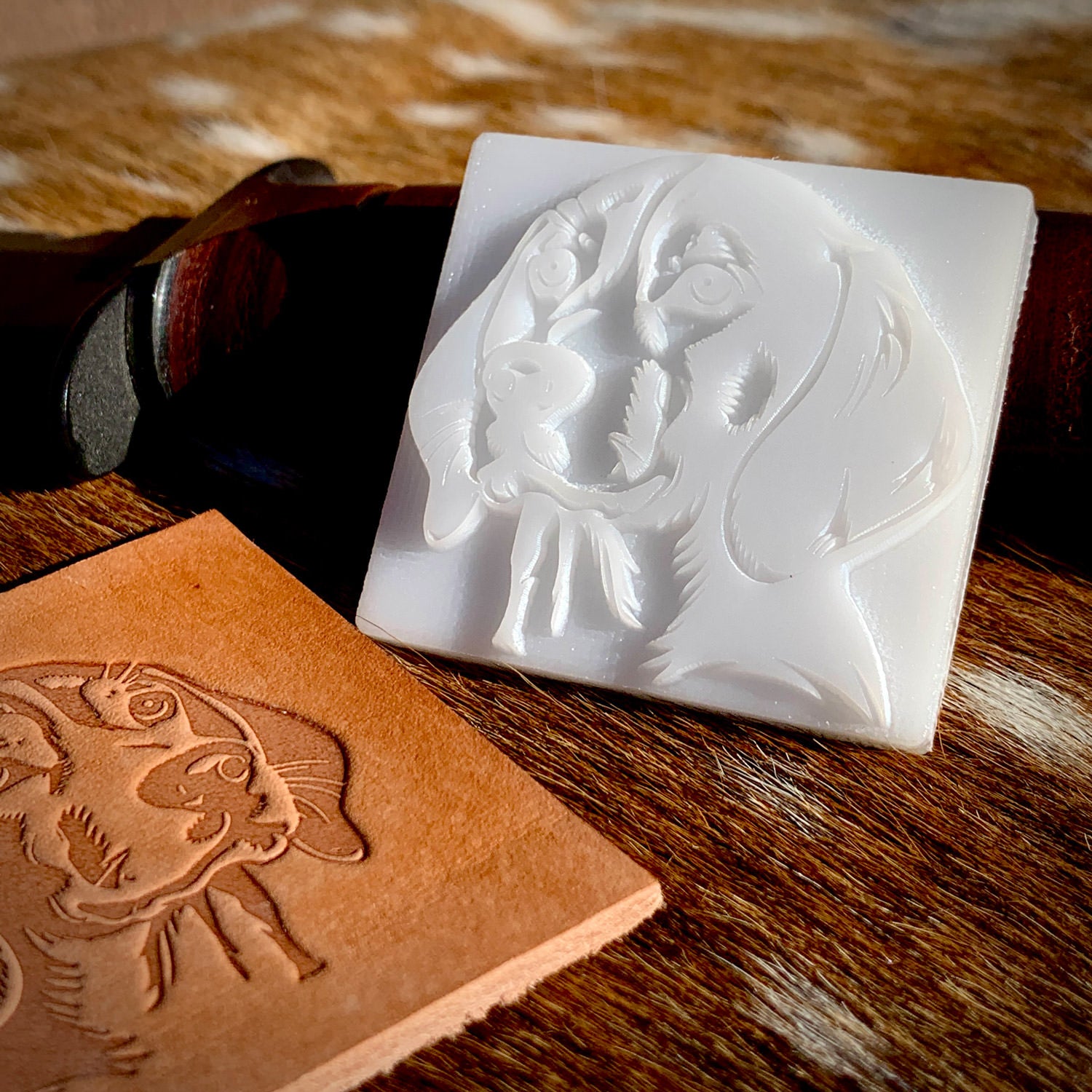 Side-by-side display of a Beagle hound dog leather stamp and its stamped leather impression, highlighting the precision of the delrin leather stamp and the rich depth it creates on leather.