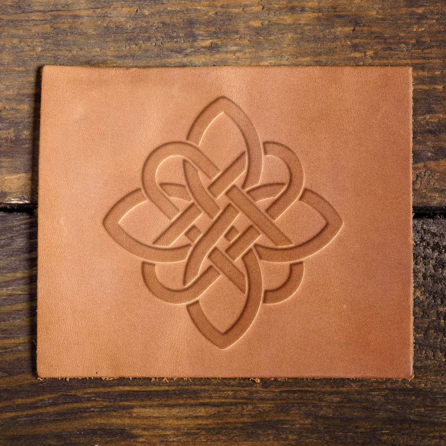 Leather sample with a crisp Celtic knot stamp impression, adding a timeless and decorative touch to leathercraft.