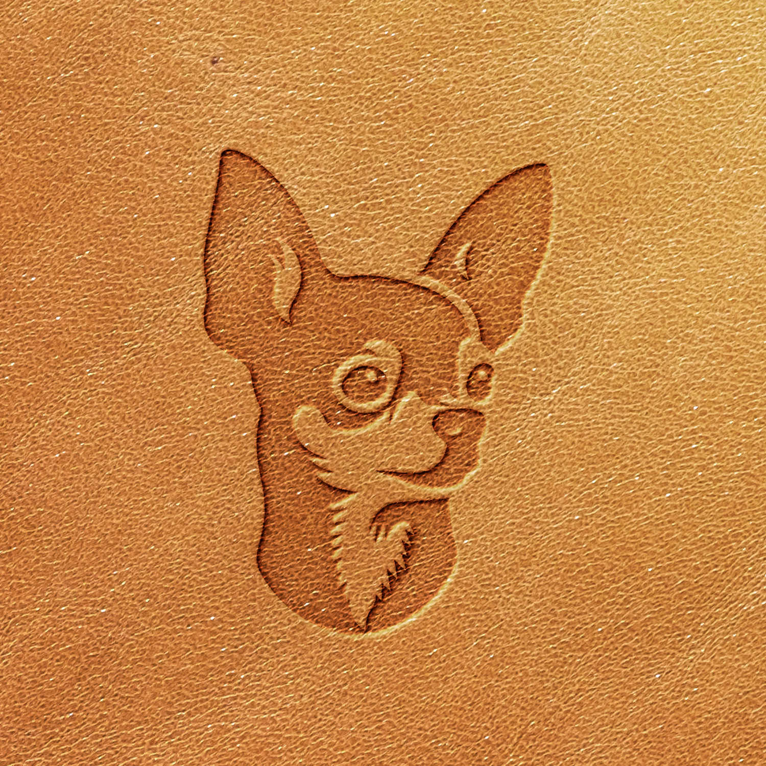 The Chihuahua Dog Delrin Leather Stamp features a detailed embossing of a chihuahua's head on a tan-colored leather surface. The small dog is depicted with large ears, round eyes, and a slightly smiling expression.