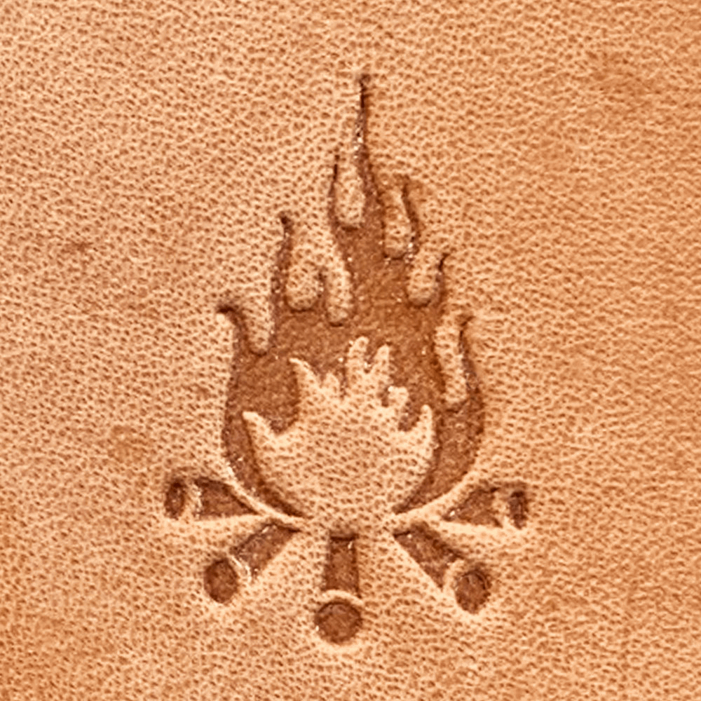 Stamped impression of a campfire with crossed logs made using a Delrin leather stamp on natural veg-tan leather.