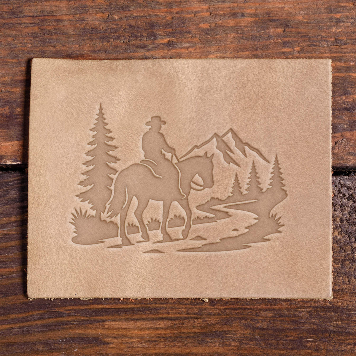 Cowboy Riding on a Mountain Trail Delrin Leather Stamp