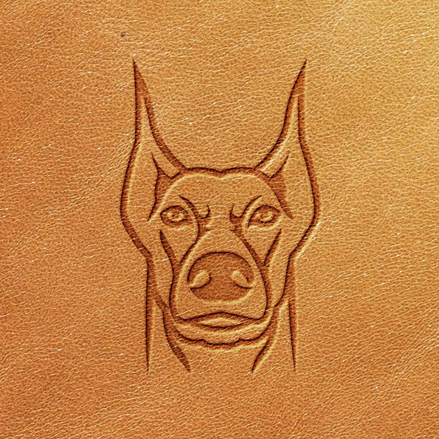 The Doberman Pinscher Dog Delrin Leather Stamp embosses the image of a dog's head with pointed ears and a serious expression onto tan leather. The detailed line work highlights the dog's facial features and the texture of the leather.