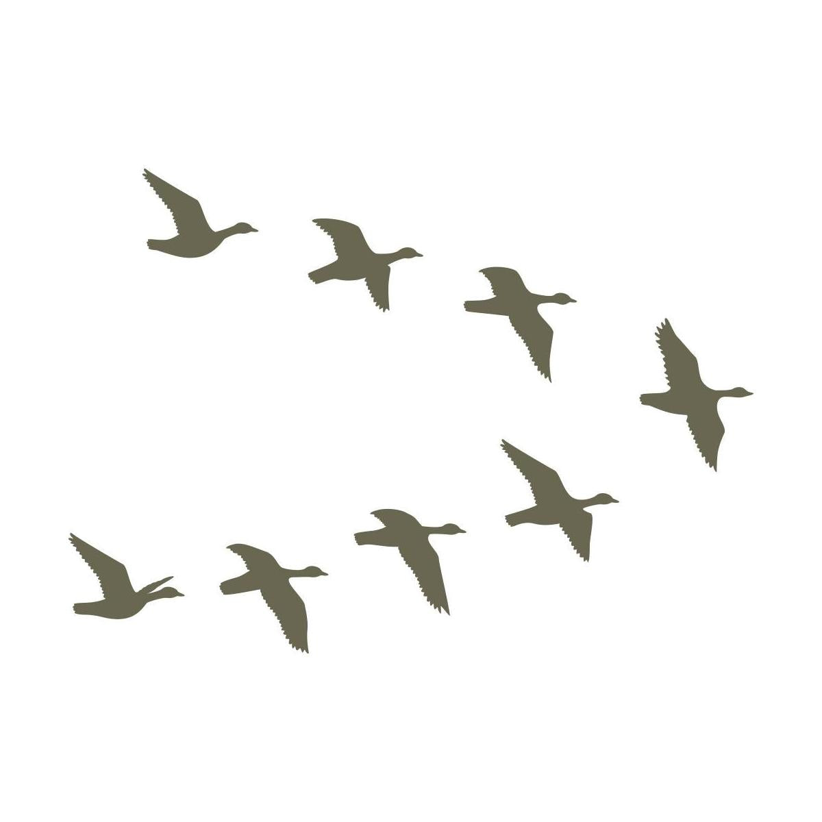 Silhouette of a flock of birds flying in a V-formation, representing migratory birds in motion.