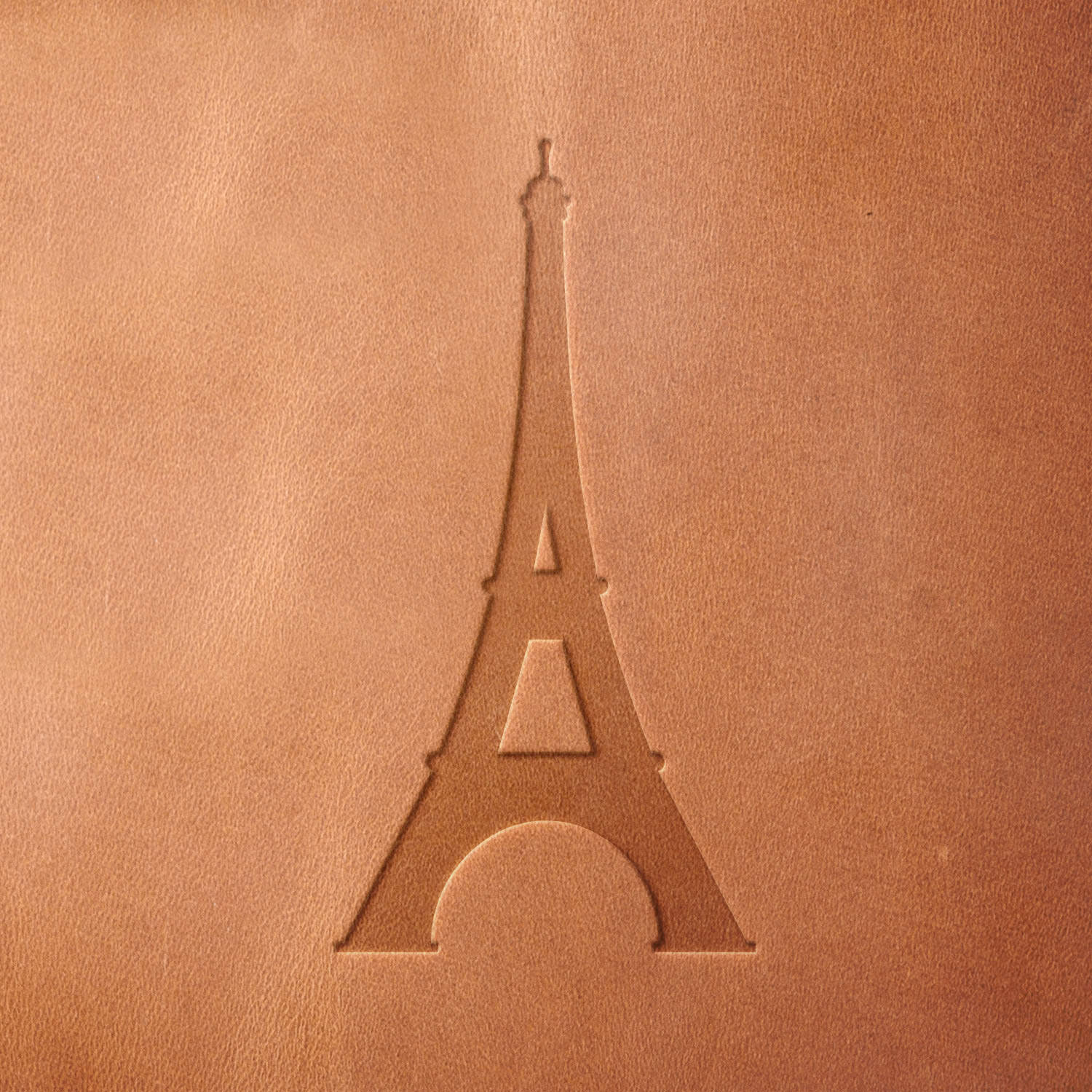 Leather sample with a crisp Eiffel Tower stamp impression, adding a Parisian touch to leather projects.