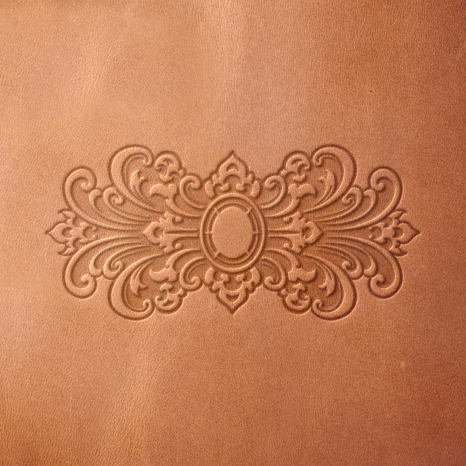 Leather sample with a crisp baroque stamp impression from a Delrin leather stamp, ideal for creating high-quality elegant and decorative-themed leathercraft projects.
