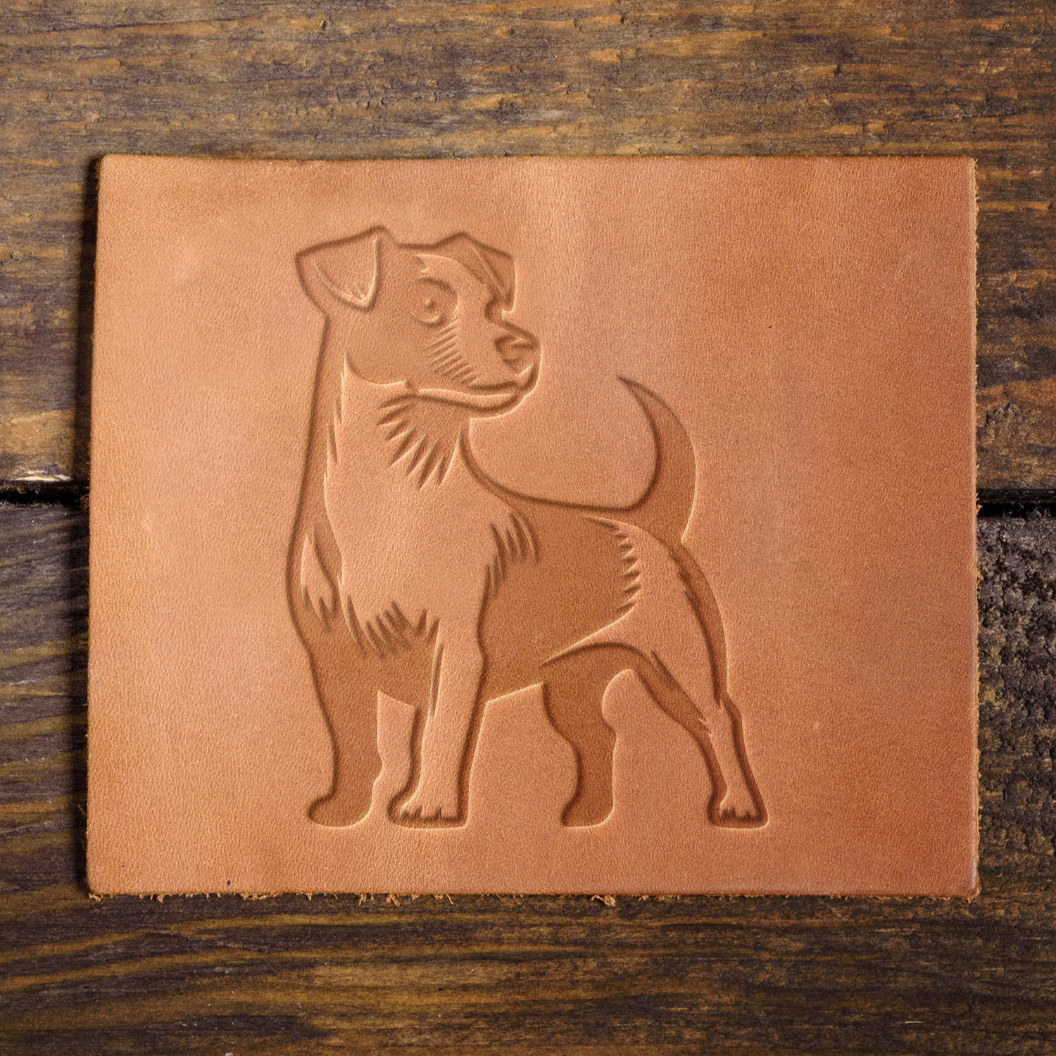 Leather sample with a crisp Jack Russell Terrier stamp impression, ideal for dog lovers and custom leather projects.