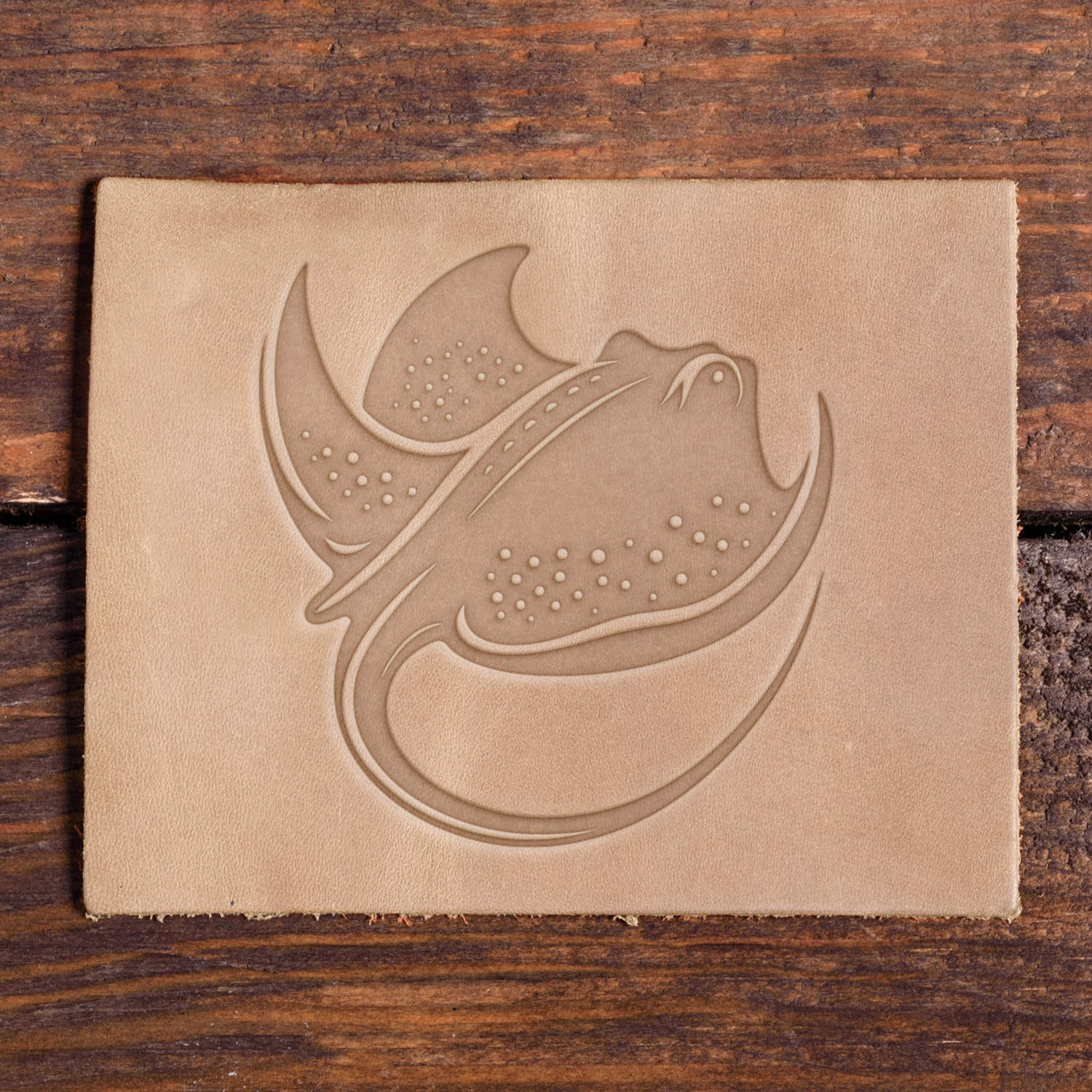 Stingray stamp impression on leather made with a Delrin leather stamp.