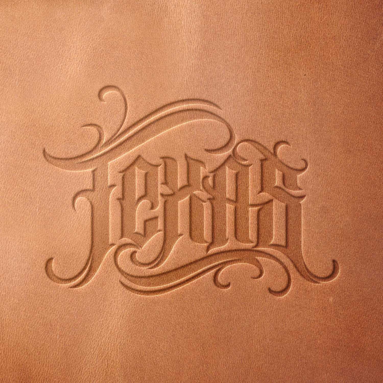 Leather sample with a crisp Texas lettering stamp impression from a Delrin leather stamp, ideal for creating high-quality Western and Southern-themed leathercraft projects.