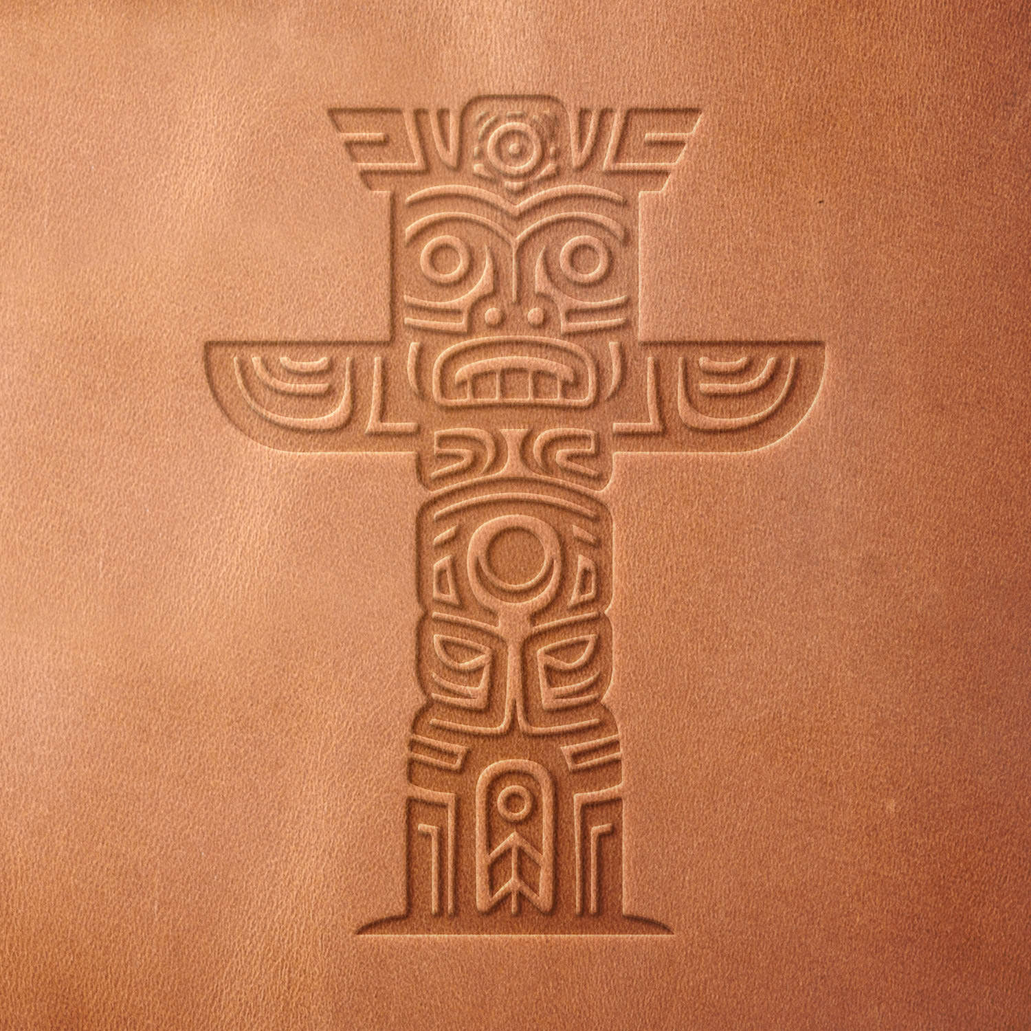 Leather sample with a crisp totem pole stamp impression from a Delrin leather stamp, ideal for creating high-quality tribal and cultural-themed leathercraft projects.