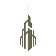 The Tower Delrin Leather Stamp features a stylized vector graphic of a skyscraper with a pointed spire at the top, rendered in monochromatic brown. This design showcases geometric shapes and clean lines, imparting an abstract, modern appearance to the building.