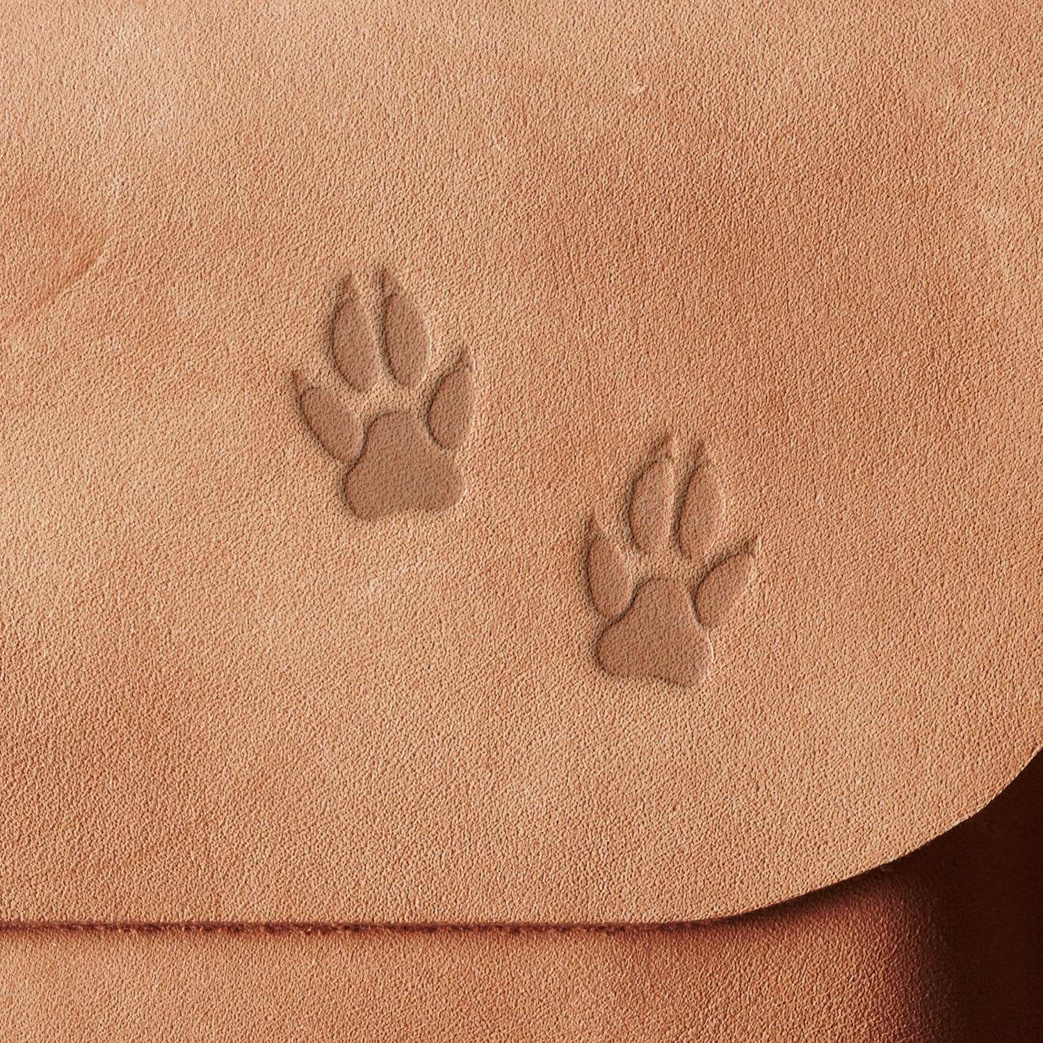 Leather product featuring paw prints design stamped with a Delrin tool, perfect for creating pet and animal-themed leather crafts