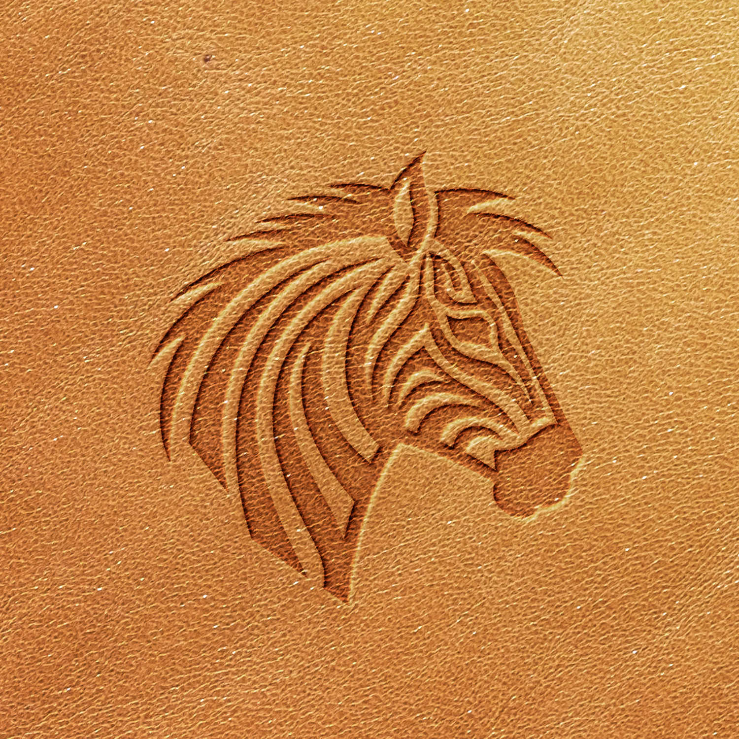 The Zebra Delrin Leather Stamp embosses a zebra's head in side profile onto a leather surface, with texture and shading adding depth to the mane and facial stripes, seamlessly integrated into the leather.