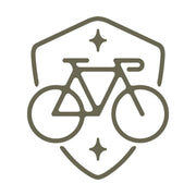 Modern bicycle emblem design featuring a sleek road bike within a shield frame, accented with decorative star details.