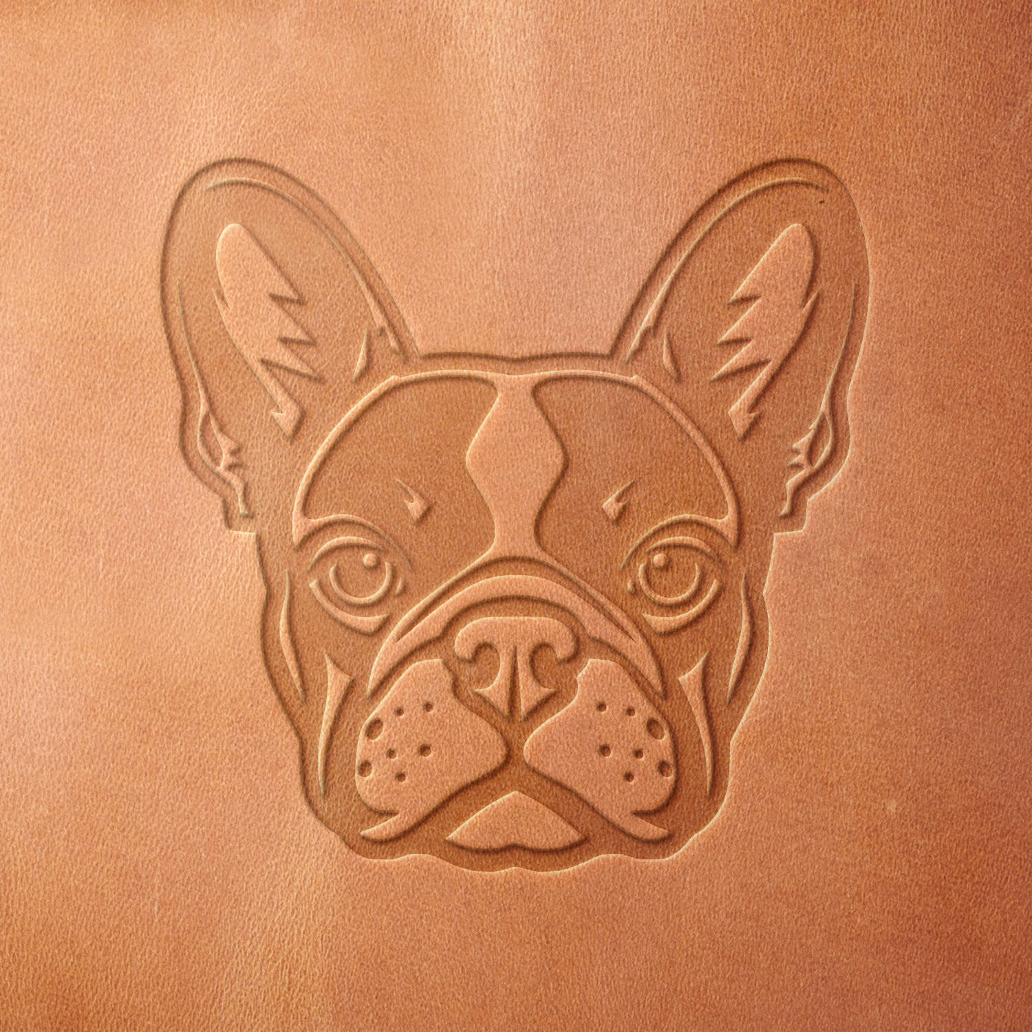 Leather sample with a crisp French Bulldog stamp impression from a Delrin leather stamp, ideal for creating high-quality dog-themed leathercraft projects.
