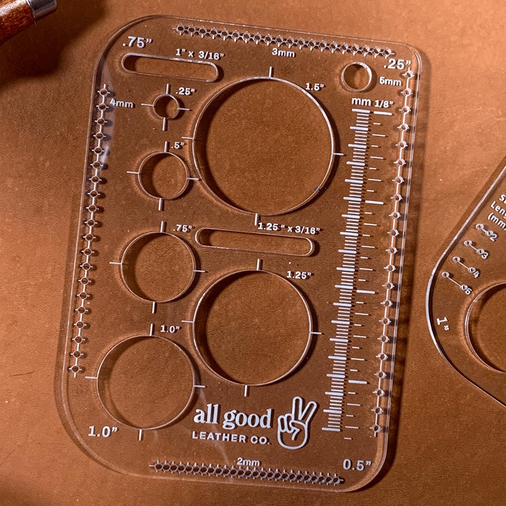 Leatherworking multi-tool shown on vegetable-tanned leather with stitched guide holes and layout markings