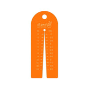 Leather thickness gauge tool made from fluorescent orange acrylic with metric and imperial markings