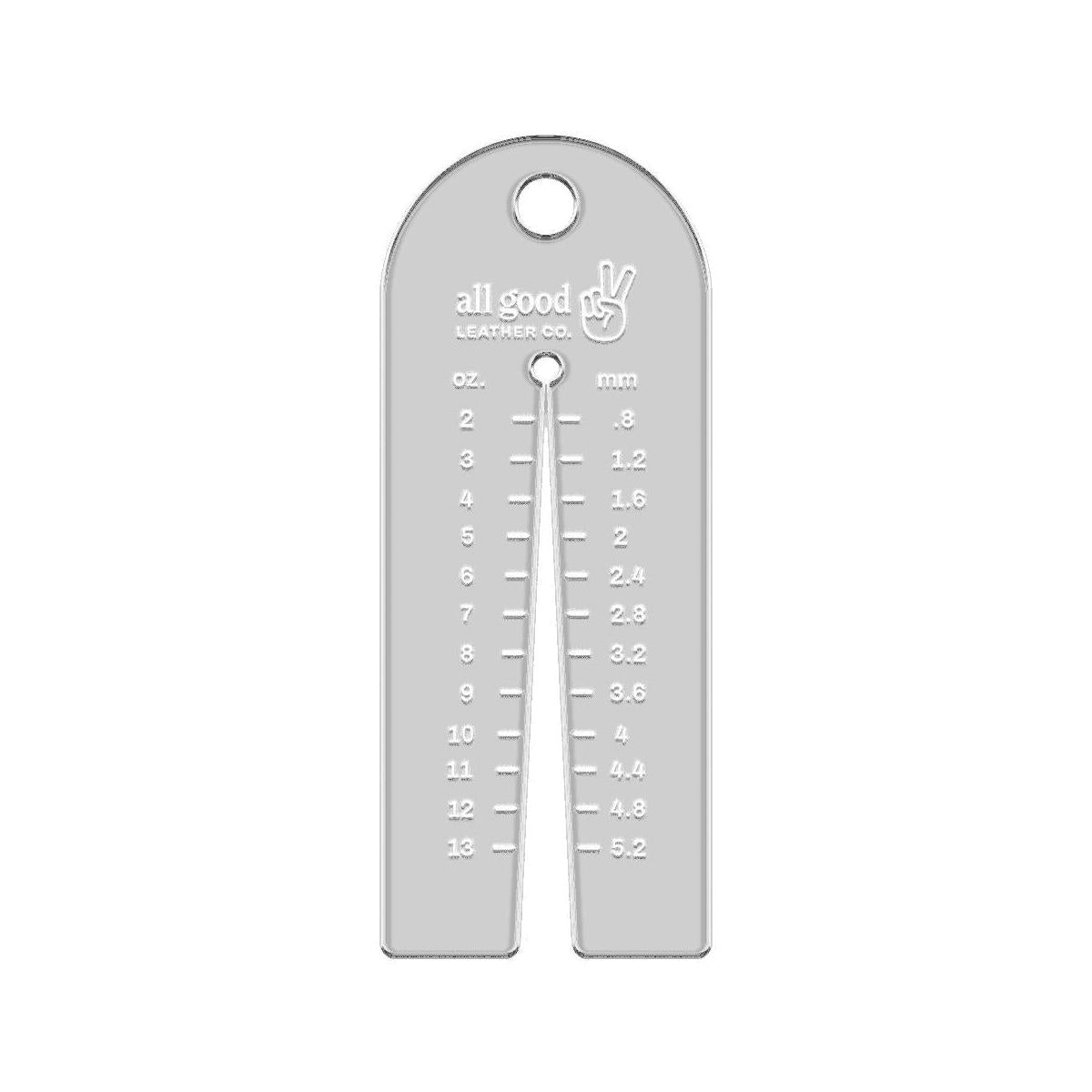 Clear acrylic leather thickness gauge tool with millimeter and ounce markings