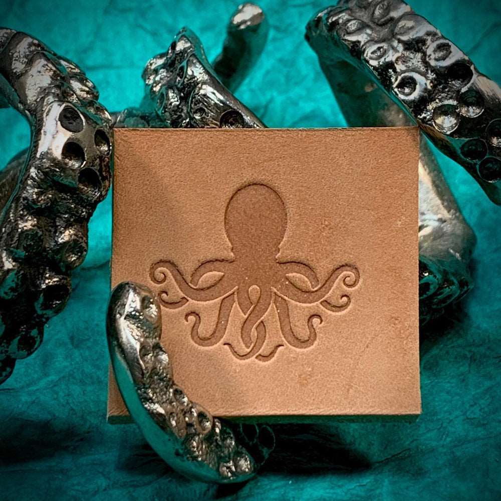 Delrin leather stamp featuring an octopus design stamped into vegetable-tanned leather.