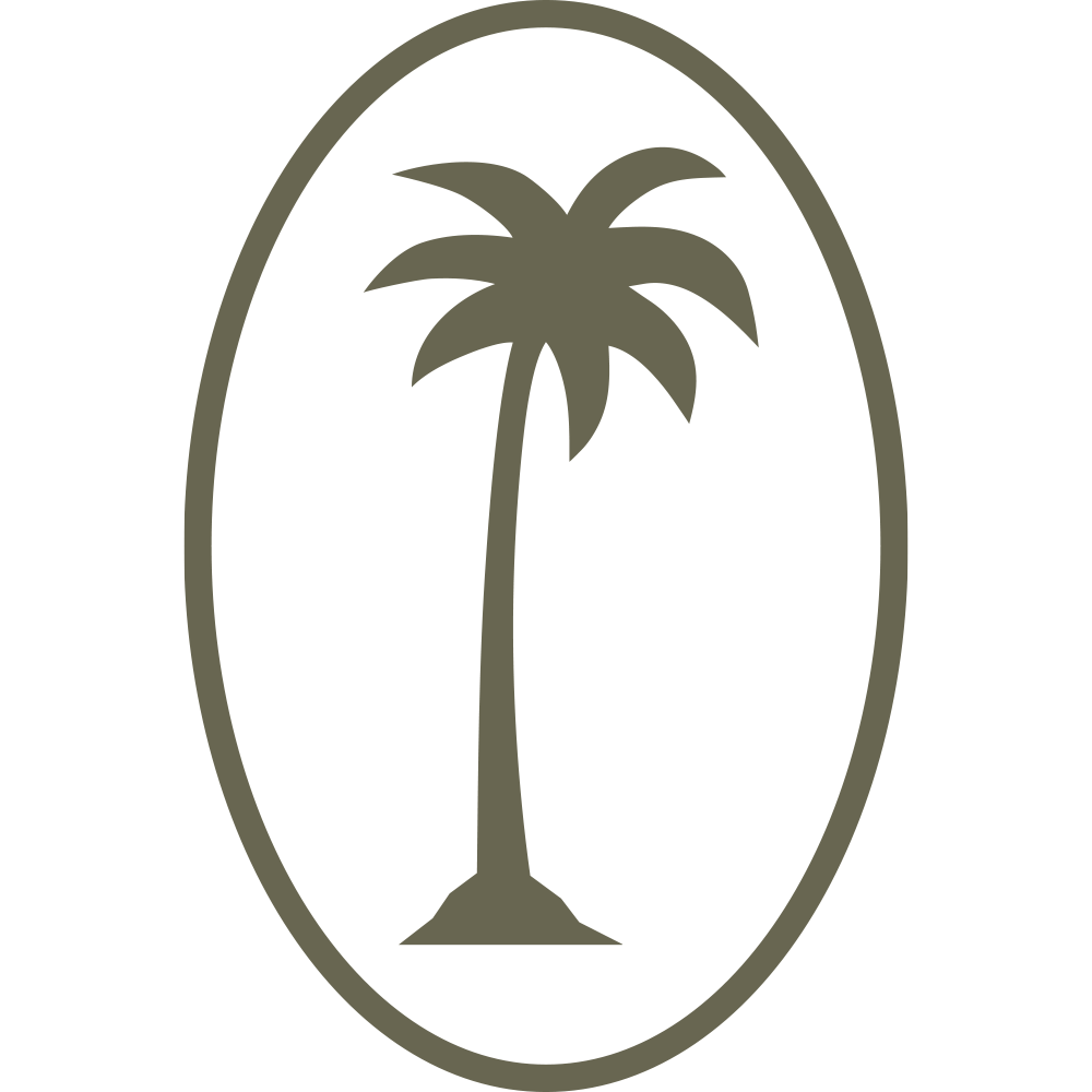 A simple depiction of a Palm Tree Delrin Leather Stamp is shown. The person is seated on a chair at a desk, which holds a computer monitor. The figure is drawn in a linear style with no facial or body details.